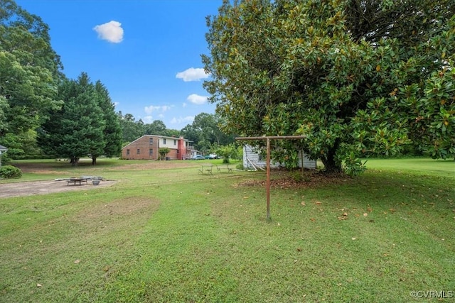 1415 New Market Rd 1411, Henrico, VA 23231 - view of green lawn with a fire pit