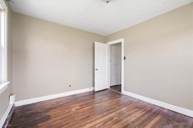 1415 New Market Rd 1411, Henrico, VA 23231 - empty room with hardwood / wood-style flooring and baseboards