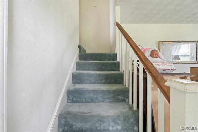 1415 New Market Rd 1411, Henrico, VA 23231 - stairs featuring carpet, a textured ceiling, and a textured wall