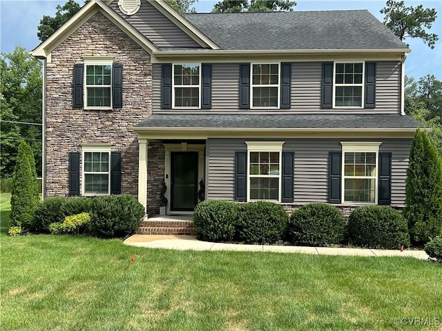 4331 Ganymede Dr, Chester, VA 23831 - traditional-style house with stone siding, a front yard, and a shingled roof