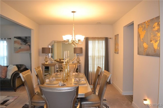 4331 Ganymede Dr, Chester, VA 23831 - dining space featuring a chandelier and baseboards