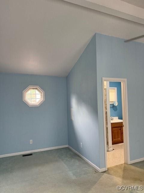4002 Crystalwood Ln, Henrico, VA 23294 - empty room featuring carpet floors and vaulted ceiling