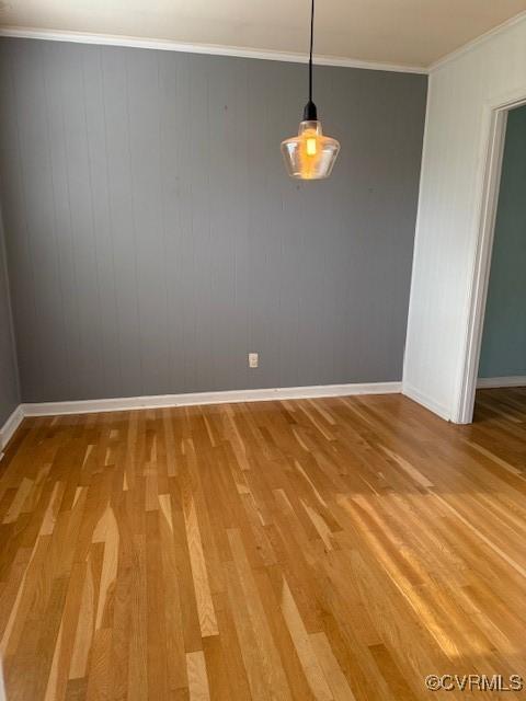 4002 Crystalwood Ln, Henrico, VA 23294 - unfurnished dining area with light wood-style floors and ornamental molding