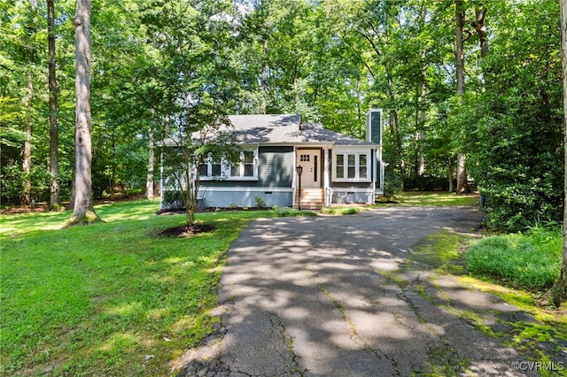 14408 Woods Walk Ct, Midlothian, VA 23112 - view of front of home with a chimney, crawl space, a front yard, and asphalt driveway