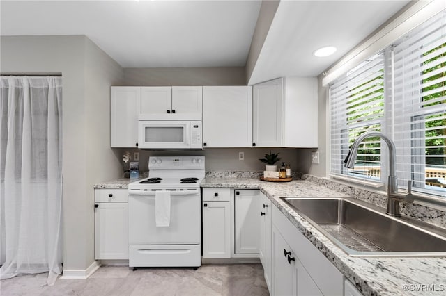 14408 Woods Walk Ct, Midlothian, VA 23112 - kitchen featuring white appliances, white cabinets, and light stone counters