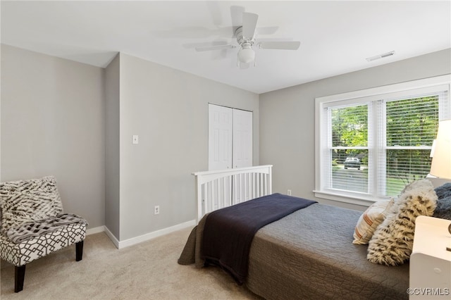 14408 Woods Walk Ct, Midlothian, VA 23112 - bedroom featuring light colored carpet, a ceiling fan, and a closet