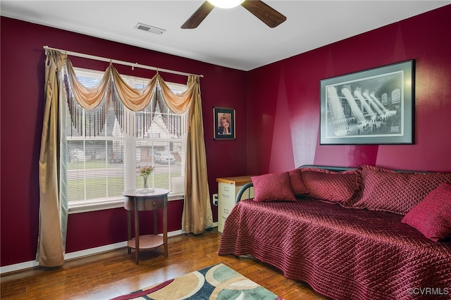 4055 Tanner Slip Cir, Chester, VA 23831 - bedroom featuring wood finished floors and a ceiling fan