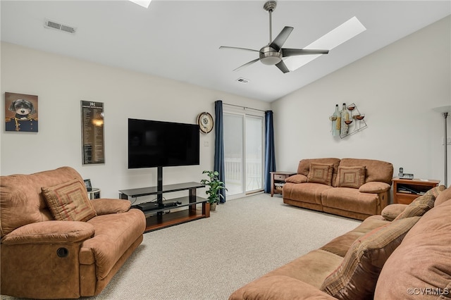 4055 Tanner Slip Cir, Chester, VA 23831 - carpeted living area with vaulted ceiling, ceiling fan, and a skylight