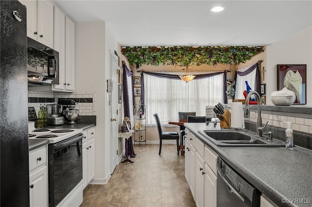 4055 Tanner Slip Cir, Chester, VA 23831 - kitchen featuring black appliances, decorative backsplash, white cabinets, dark countertops, and recessed lighting