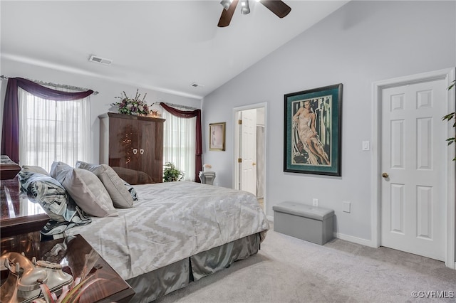 4055 Tanner Slip Cir, Chester, VA 23831 - bedroom with vaulted ceiling, multiple windows, carpet floors, a ceiling fan, and ensuite bathroom