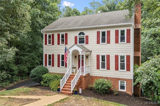 6003 Lansgate Rd, Midlothian, VA 23112 - colonial house with a chimney, a shingled roof, and brick siding