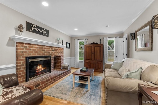 6003 Lansgate Rd, Midlothian, VA 23112 - living area with wood finished floors, crown molding, a fireplace, and recessed lighting