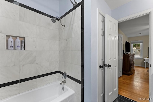 6003 Lansgate Rd, Midlothian, VA 23112 - bathroom with shower / tub combination and wood finished floors