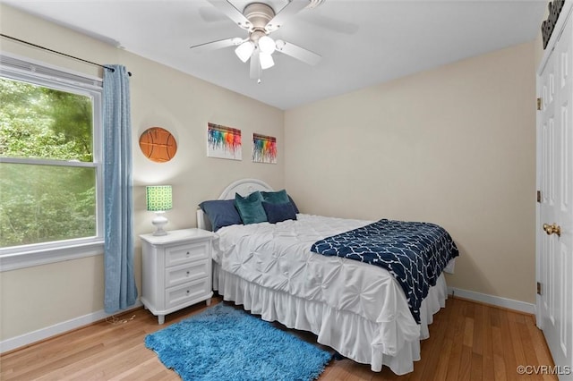 6003 Lansgate Rd, Midlothian, VA 23112 - bedroom with wood finished floors, a closet, and a ceiling fan