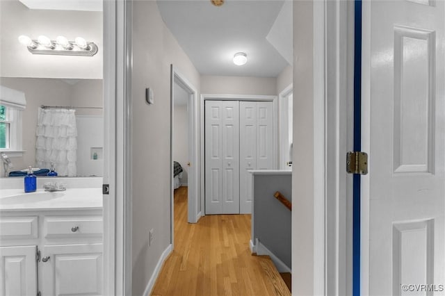 6003 Lansgate Rd, Midlothian, VA 23112 - hall featuring light wood-type flooring and a sink