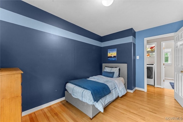 6003 Lansgate Rd, Midlothian, VA 23112 - bedroom with wood finished floors and washer / dryer