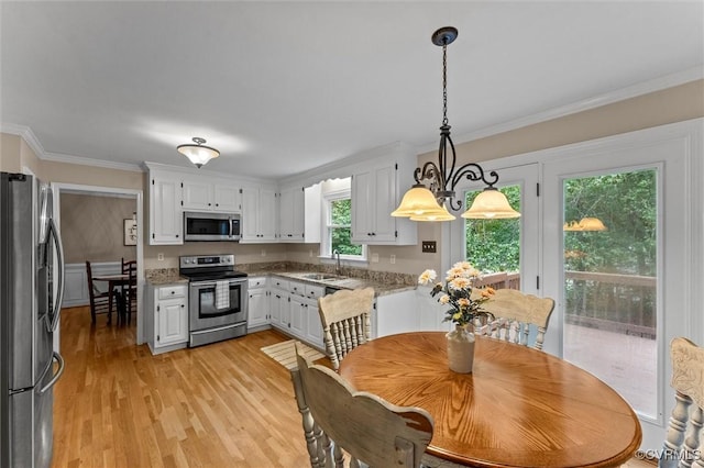 6003 Lansgate Rd, Midlothian, VA 23112 - dining area with light wood-style floors and crown molding