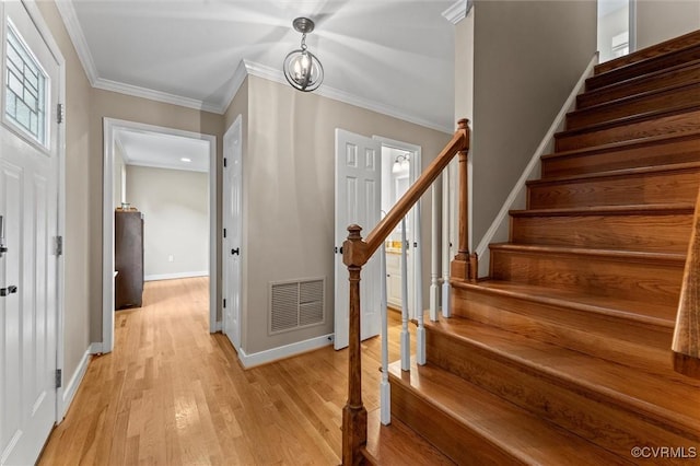 6003 Lansgate Rd, Midlothian, VA 23112 - staircase with wood finished floors and ornamental molding