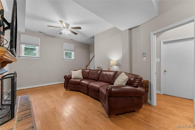 6003 Lansgate Rd, Midlothian, VA 23112 - living area with ceiling fan, light wood-style floors, and stairway