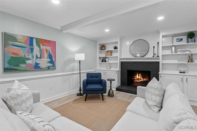 13219 Lauren Ln, Midlothian, VA 23114 - living area with light wood-type flooring, a fireplace, beamed ceiling, recessed lighting, and ornamental molding