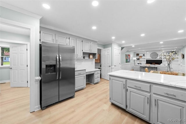 13219 Lauren Ln, Midlothian, VA 23114 - kitchen with gray cabinetry, stainless steel refrigerator with ice dispenser, ornamental molding, light wood-style flooring, and recessed lighting