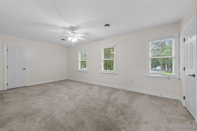 13219 Lauren Ln, Midlothian, VA 23114 - unfurnished room featuring light colored carpet, plenty of natural light, and a ceiling fan