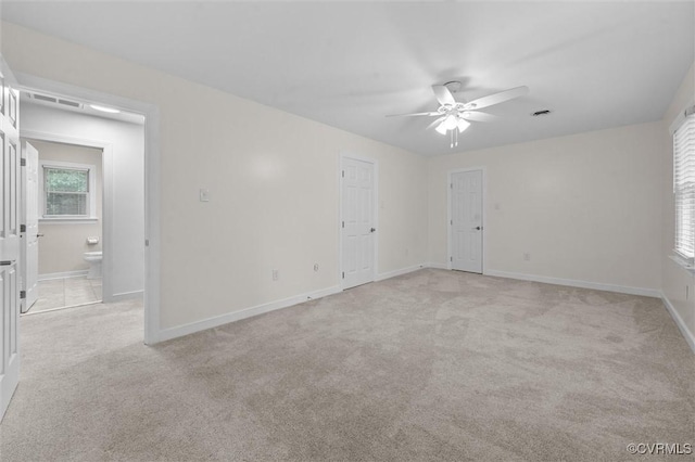 13219 Lauren Ln, Midlothian, VA 23114 - empty room with ceiling fan, light carpet, and plenty of natural light