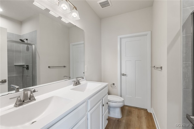 1665 Ewing Park Loop, Midlothian, VA 23113 - full bath with wood finished floors, double vanity, and tiled shower