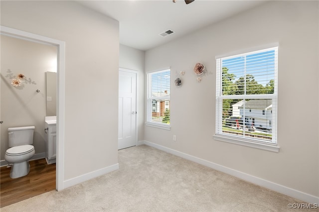1665 Ewing Park Loop, Midlothian, VA 23113 - unfurnished bedroom featuring carpet and connected bathroom