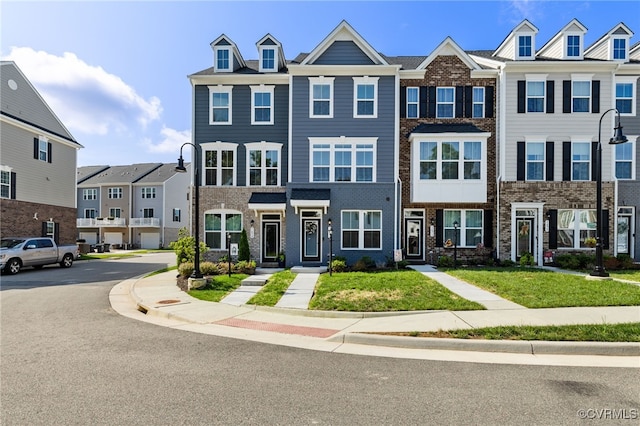 1665 Ewing Park Loop, Midlothian, VA 23113 - view of front of property with brick siding and a residential view