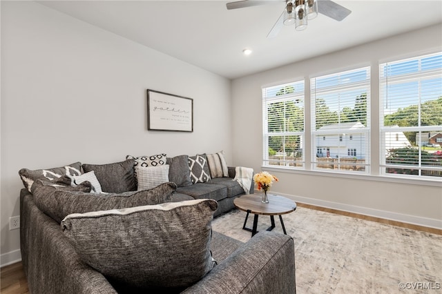 1665 Ewing Park Loop, Midlothian, VA 23113 - living room featuring wood finished floors and a ceiling fan