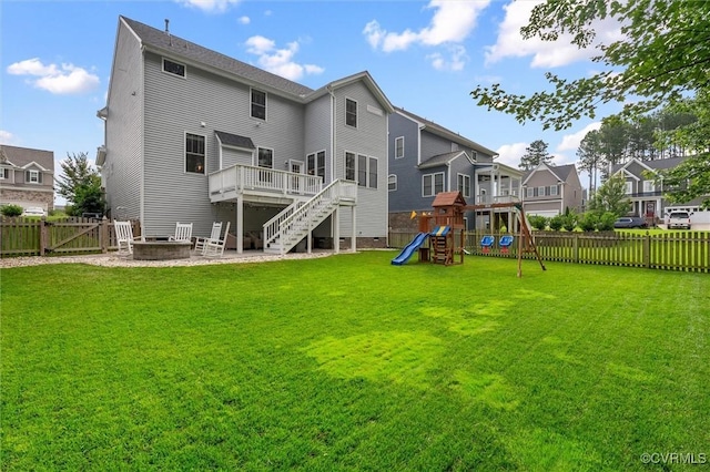 18007 Twin Falls Ln, Moseley, VA 23120 - rear view of property with a fenced backyard, a wooden deck, a playground, a patio, and stairs