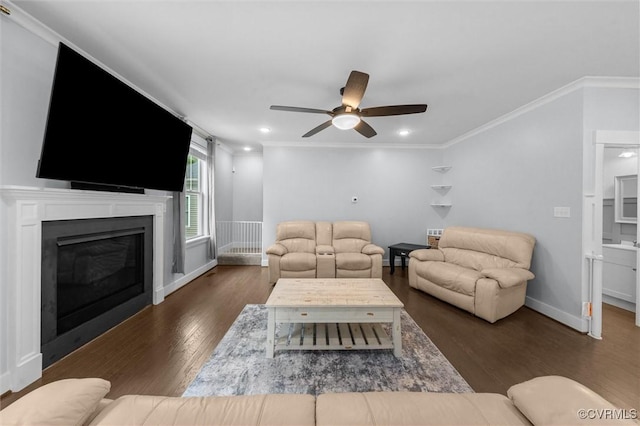 18007 Twin Falls Ln, Moseley, VA 23120 - living area with wood finished floors, a ceiling fan, a glass covered fireplace, ornamental molding, and recessed lighting
