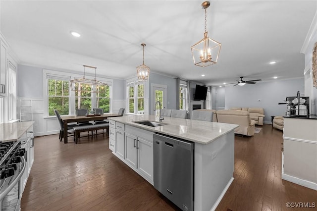 18007 Twin Falls Ln, Moseley, VA 23120 - kitchen featuring appliances with stainless steel finishes, a ceiling fan, a chandelier, a fireplace, and ornamental molding