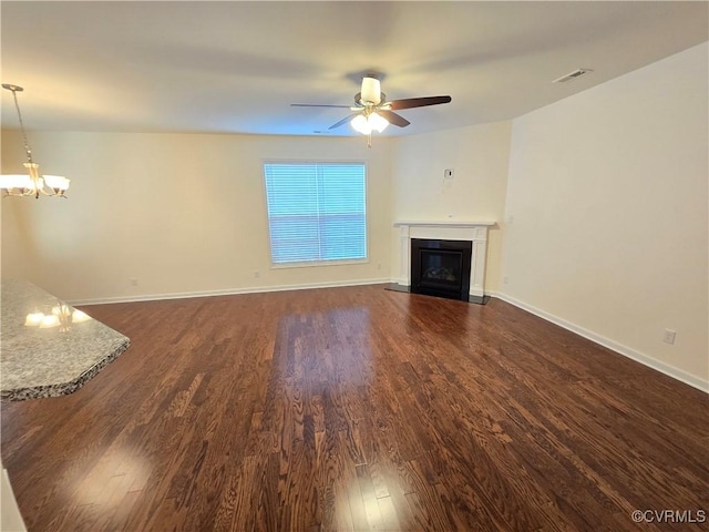16813 Laurel Park Dr, Moseley, VA 23120 - unfurnished living room with dark wood-style flooring, a fireplace with flush hearth, a chandelier, and ceiling fan