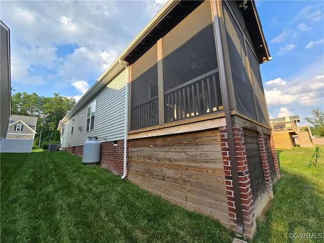 16813 Laurel Park Dr, Moseley, VA 23120 - view of side of home featuring a yard and a sunroom