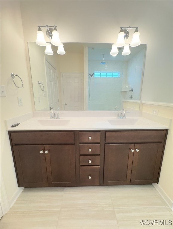16813 Laurel Park Dr, Moseley, VA 23120 - bathroom with a chandelier, double vanity, a shower, and tile patterned flooring