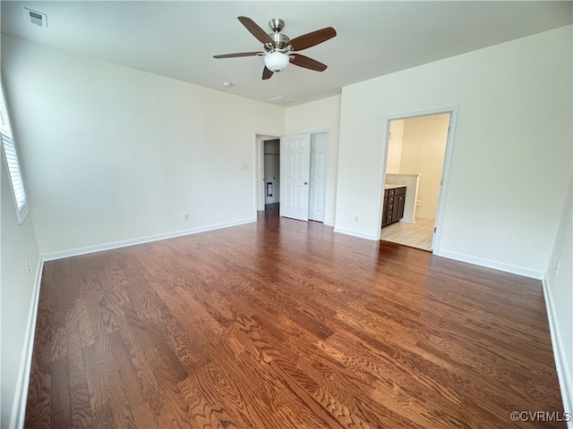 16813 Laurel Park Dr, Moseley, VA 23120 - unfurnished bedroom featuring wood finished floors, ensuite bath, and a ceiling fan