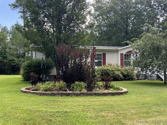 102 Mechams Cove Rd, Topping, VA 23169 - view of side of home with a yard