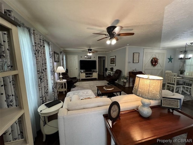 102 Mechams Cove Rd, Topping, VA 23169 - living room with a ceiling fan, a chandelier, and wood finished floors