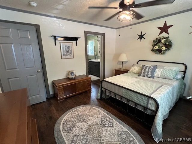 102 Mechams Cove Rd, Topping, VA 23169 - bedroom featuring wood finished floors, ensuite bath, a ceiling fan, and ornamental molding