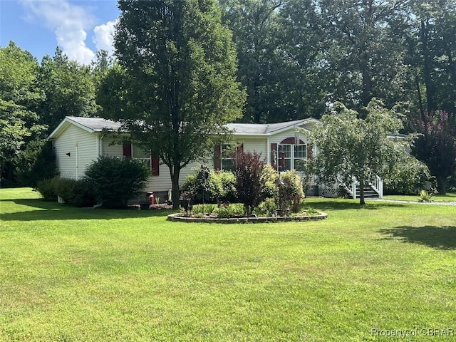 102 Mechams Cove Rd, Topping, VA 23169 - view of front facade featuring a front yard