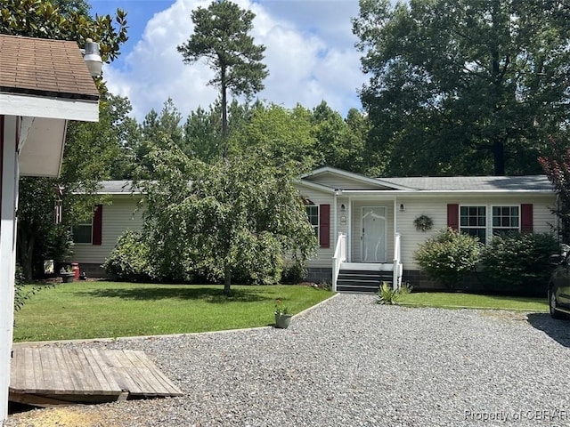 102 Mechams Cove Rd, Topping, VA 23169 - view of front facade featuring a front yard