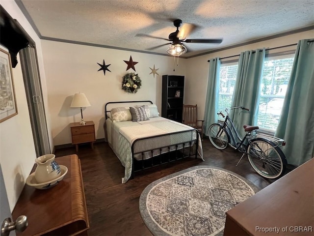 102 Mechams Cove Rd, Topping, VA 23169 - bedroom with wood finished floors, ornamental molding, a textured ceiling, and a ceiling fan