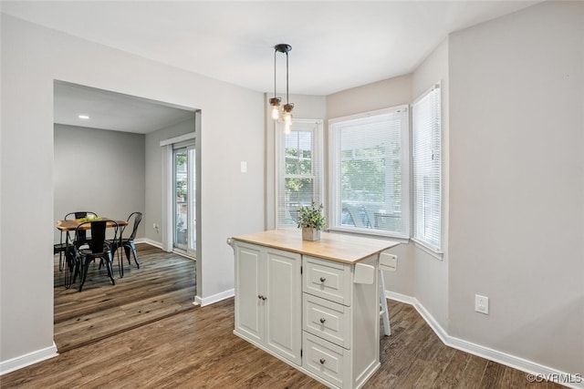 7117 Deer Thicket Dr, Midlothian, VA 23112 - dining space featuring dark wood-type flooring and baseboards