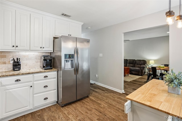 7117 Deer Thicket Dr, Midlothian, VA 23112 - kitchen featuring stainless steel fridge with ice dispenser, wood finished floors, backsplash, and white cabinets