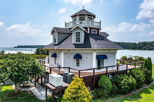 744 Possum Point Rd, Port Haywood, VA 23109 - victorian house featuring a balcony and a deck with water view