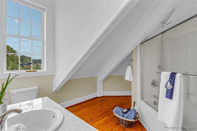 744 Possum Point Rd, Port Haywood, VA 23109 - full bathroom with wood finished floors, vanity, and shower / bathtub combination