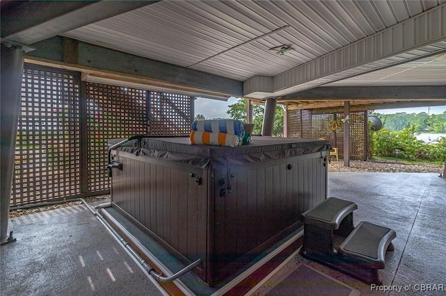 744 Possum Point Rd, Port Haywood, VA 23109 - deck with a hot tub and a patio