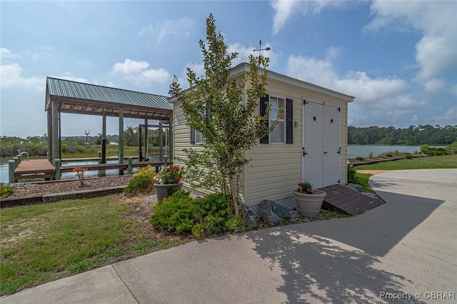 744 Possum Point Rd, Port Haywood, VA 23109 - view of outdoor structure featuring a water view